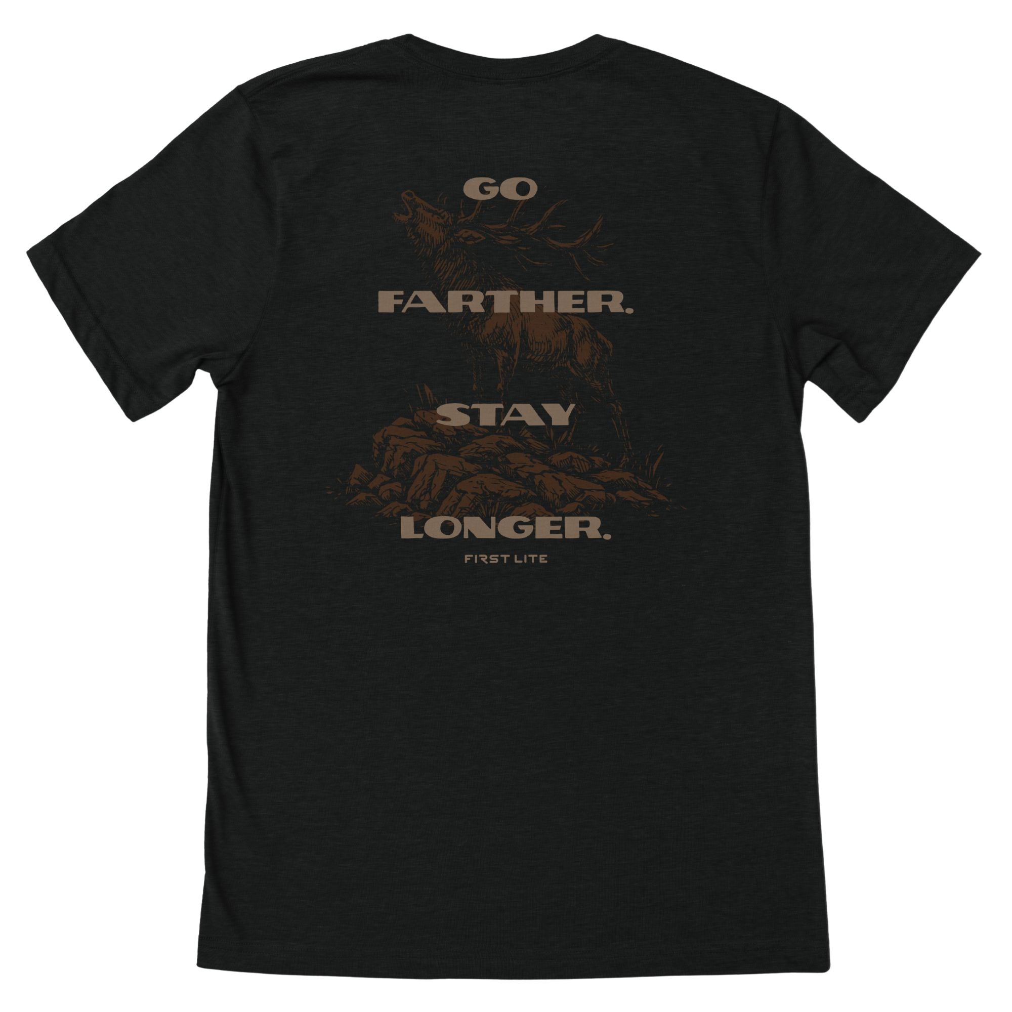 Black T-Shirt with brown text "GO FARTHER. STAY LONGER." and "FIRST LITE" with a brown elk in the background.