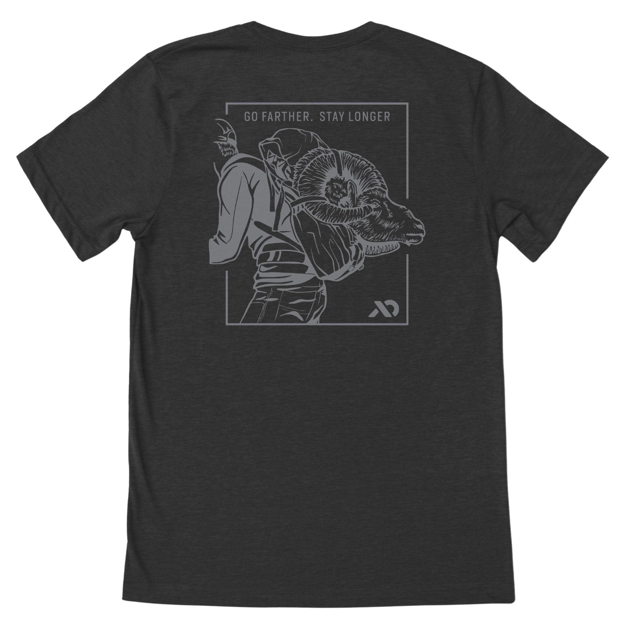 Dark gray t-shirt with a light gray graphic on the back: a framed illustration of a person carrying a bighorn ram, topped by the text 'GO FARTHER. STAY LONGER'.