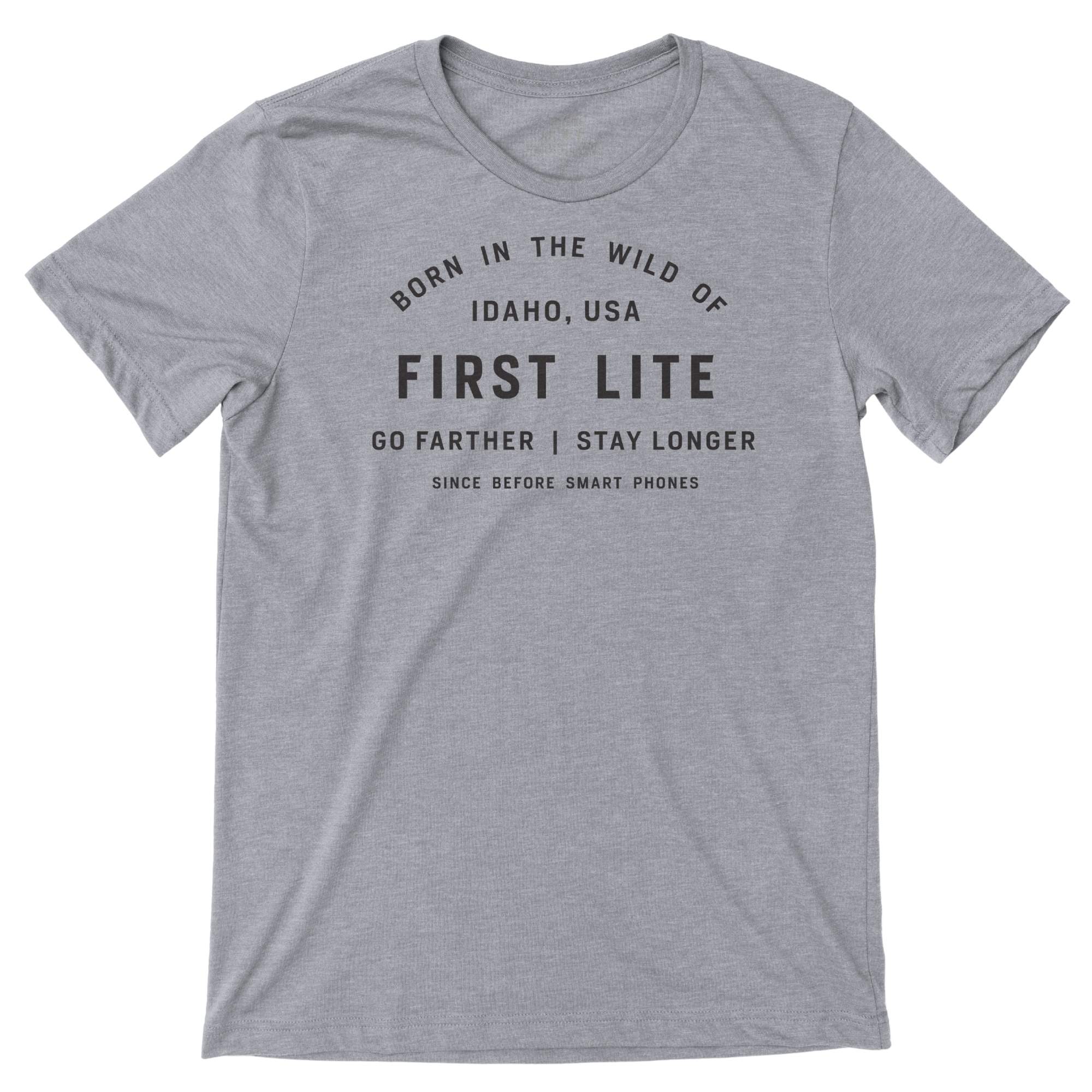Gray t-shirt featuring black text graphic "Born in the Wild of Idaho, USA First Lite Go Farther | Stay Longer Since Before Smart Phones".