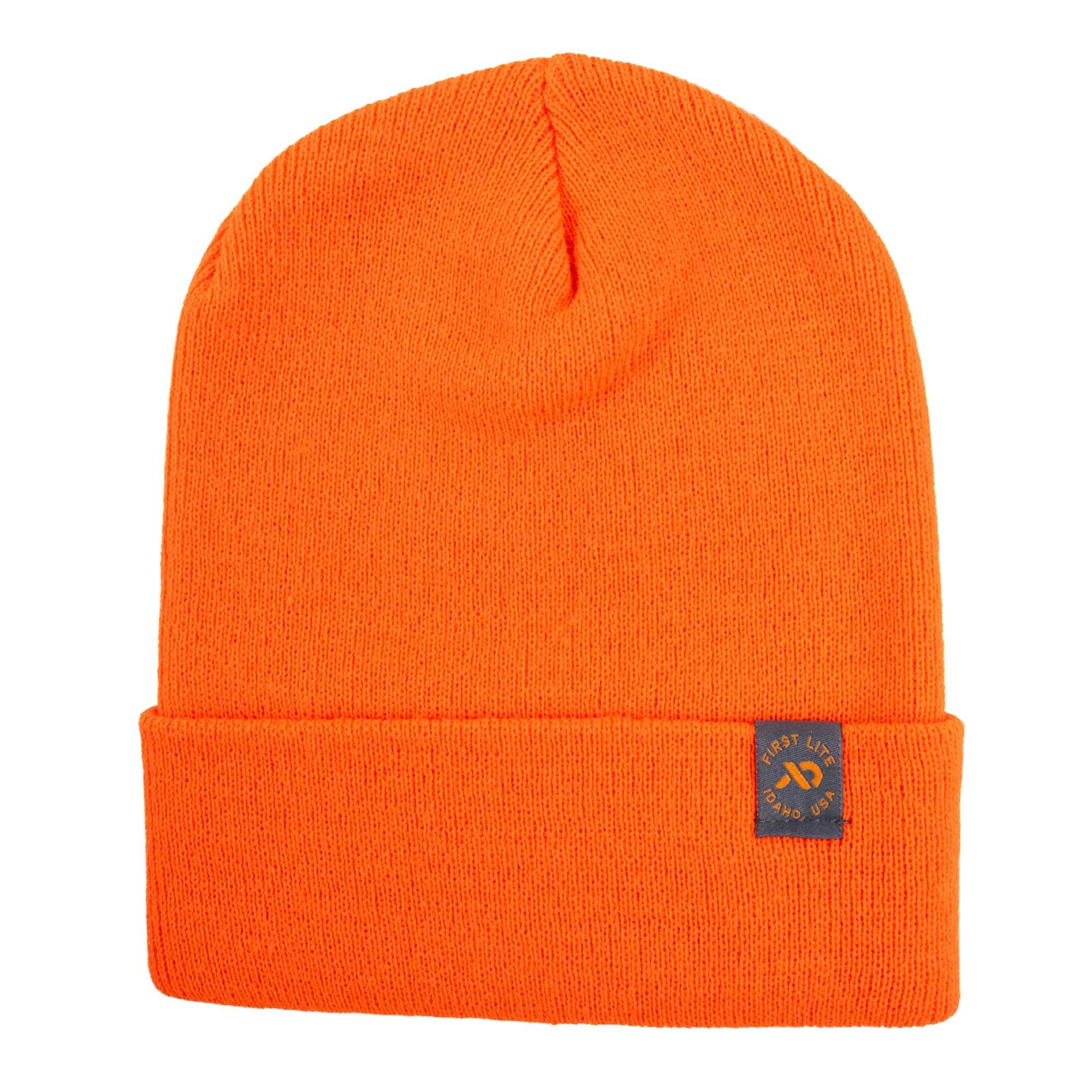 Orange ribbed knit beanie with a folded cuff and a black square patch featuring an orange FIRST LITE logo.