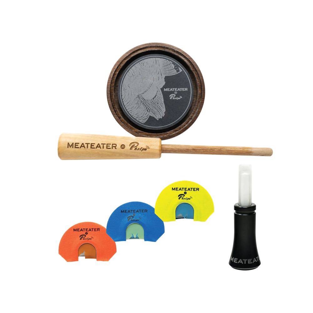 MEATEATER Phelps turkey call set: wood pot call, striker, 3 colorful diaphragm, and black tube calls.